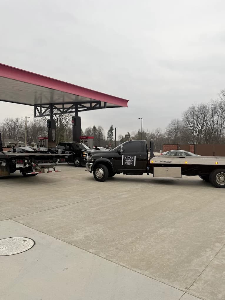 Prime O Towing flatbed tow truck at a Metro Detroit truck stop between dispatch calls